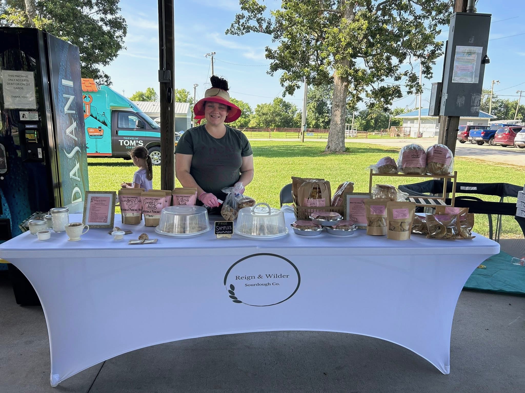 Reign & Wilder market tent and bakery table setup at a Rogersville Missouri market